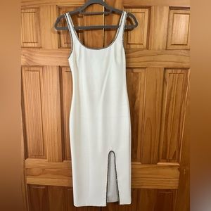 White sleeveless dress with beaded detail